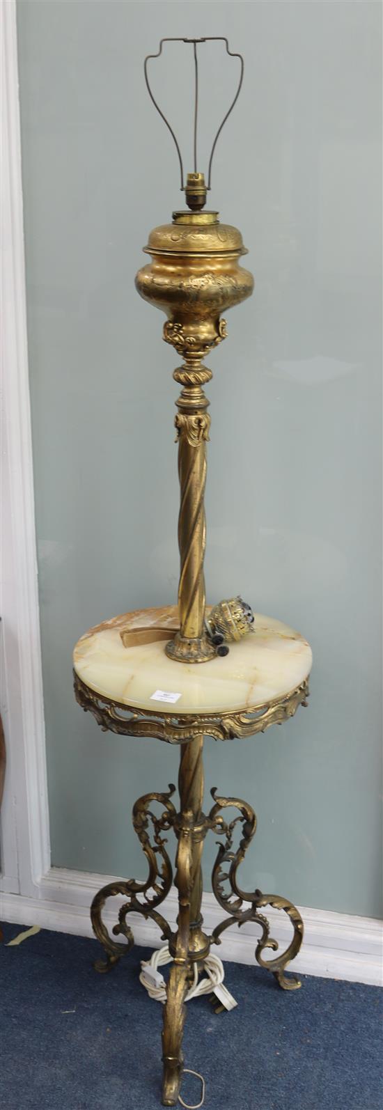 A brass and onyx standard lamp W.40cm